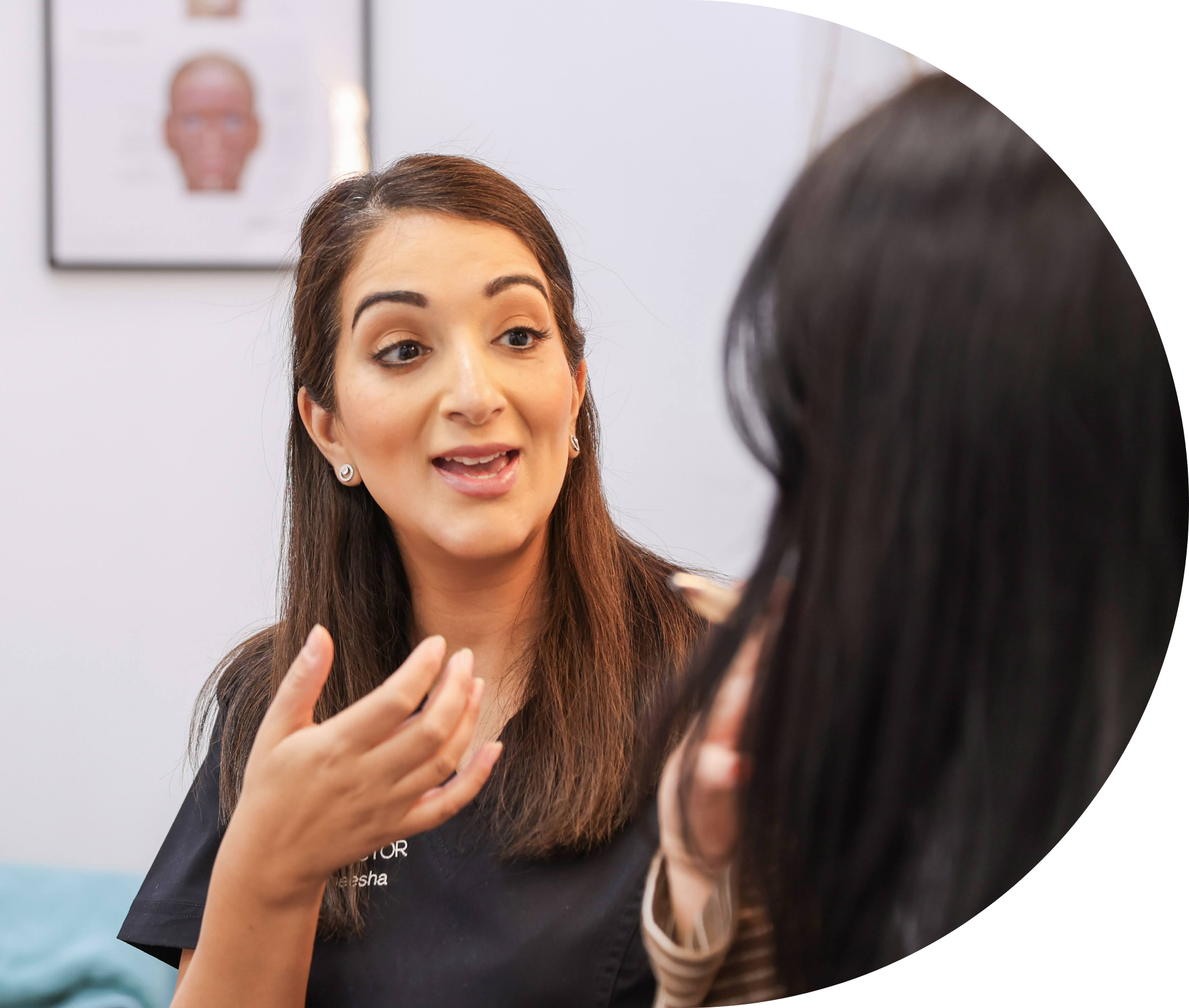 Dr Aneesha talking with a patient