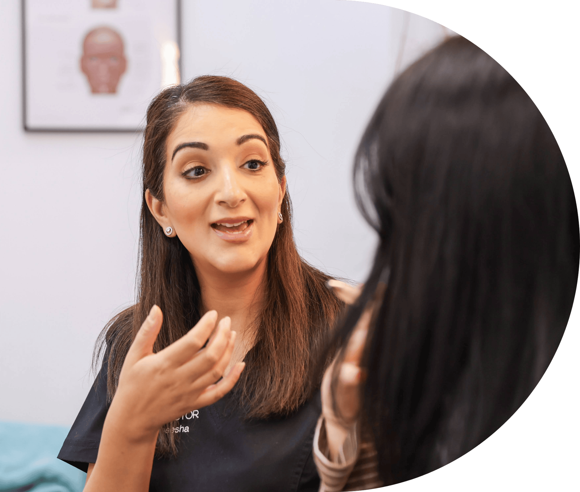 Dr Aneesha talking with a patient