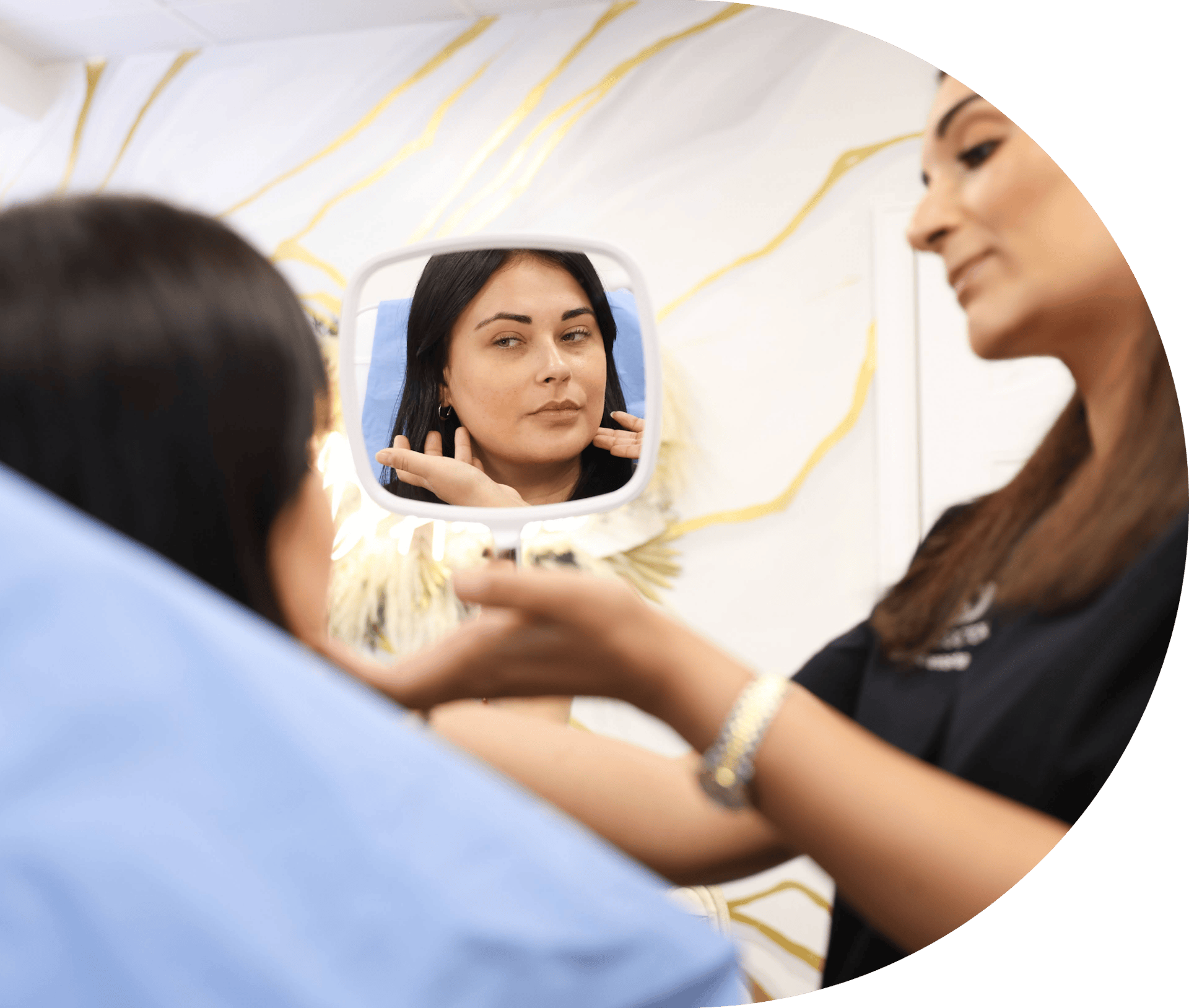 A patient looking in the mirror at her results