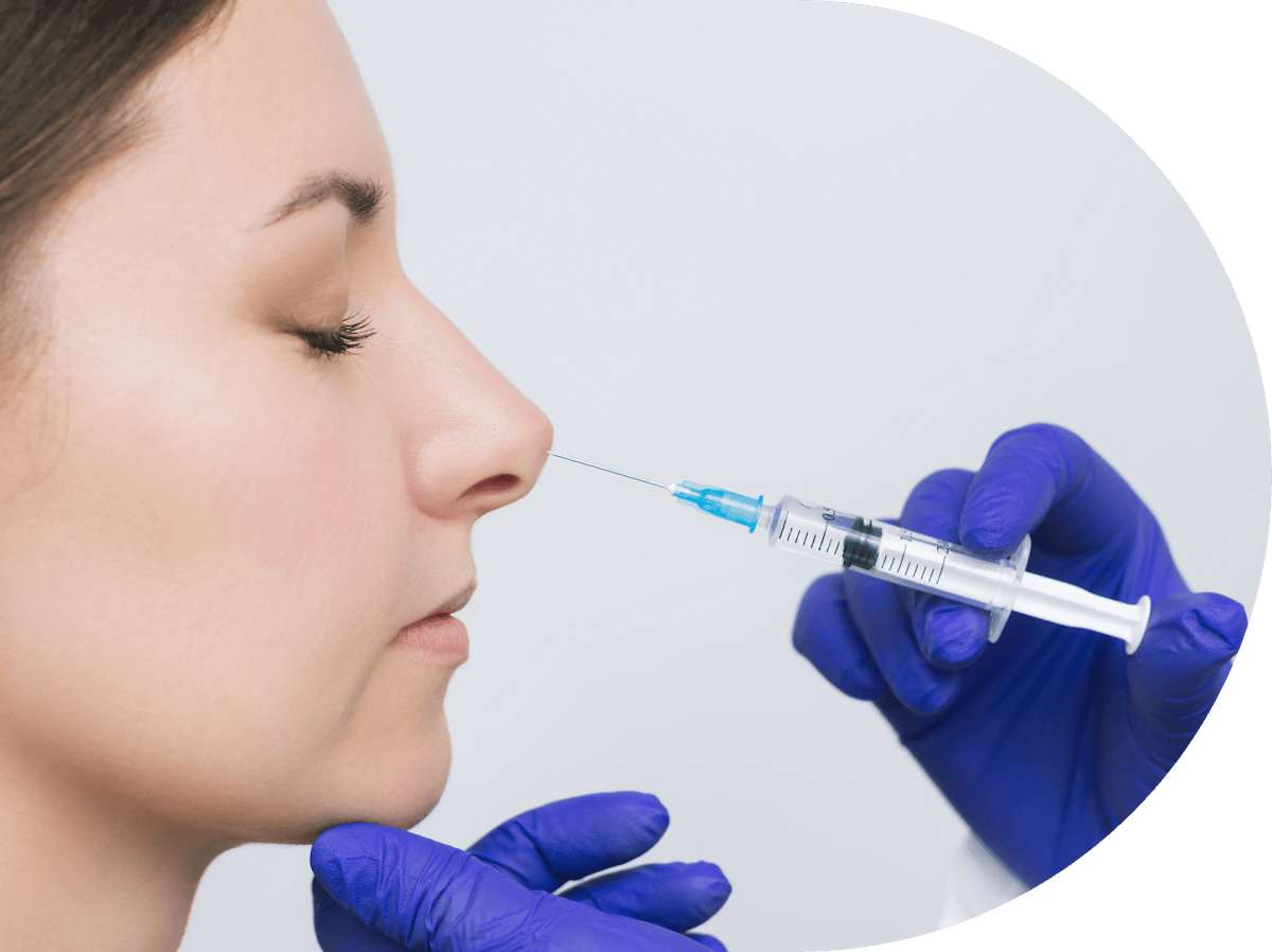 woman having nose tip anti wrinkle treatment