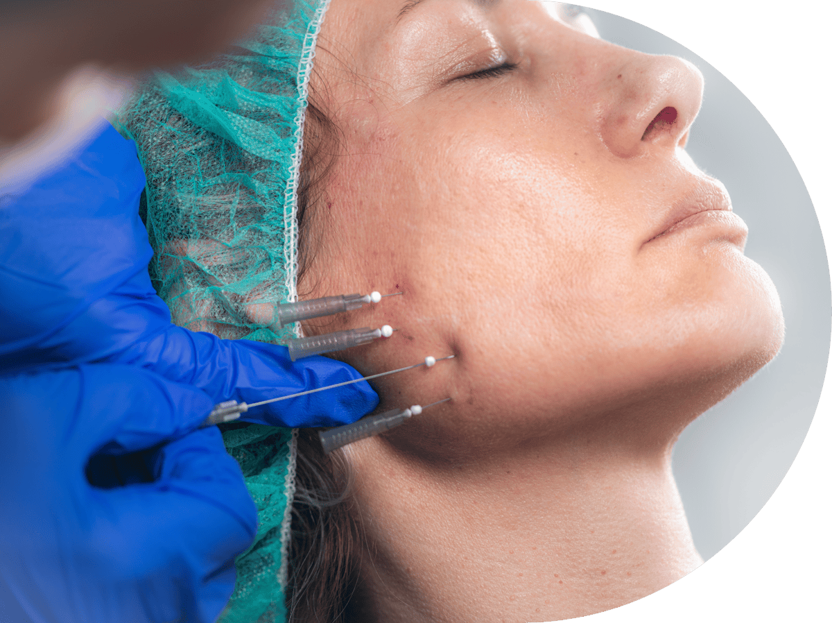 woman having masseter injection treatment