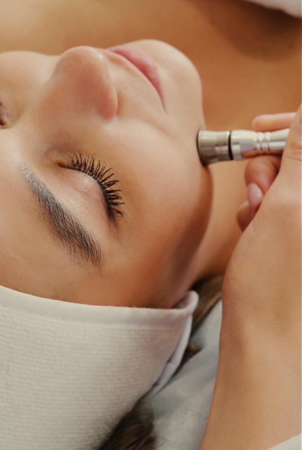 close up of a woman having full face micro needling treatment