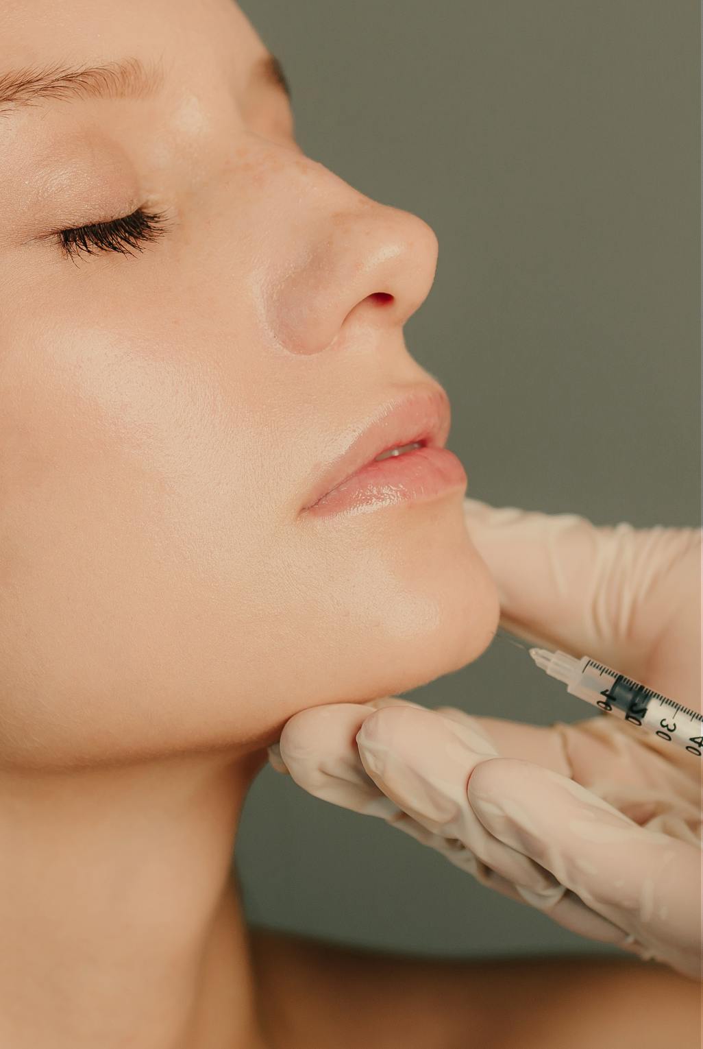 a woman having a chin injection