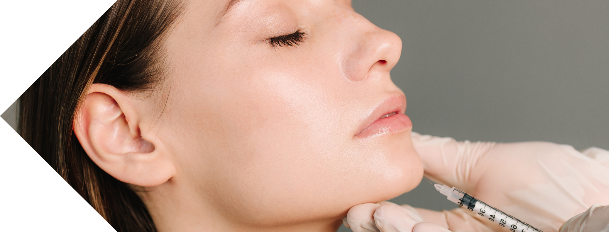 a woman having a chin injection