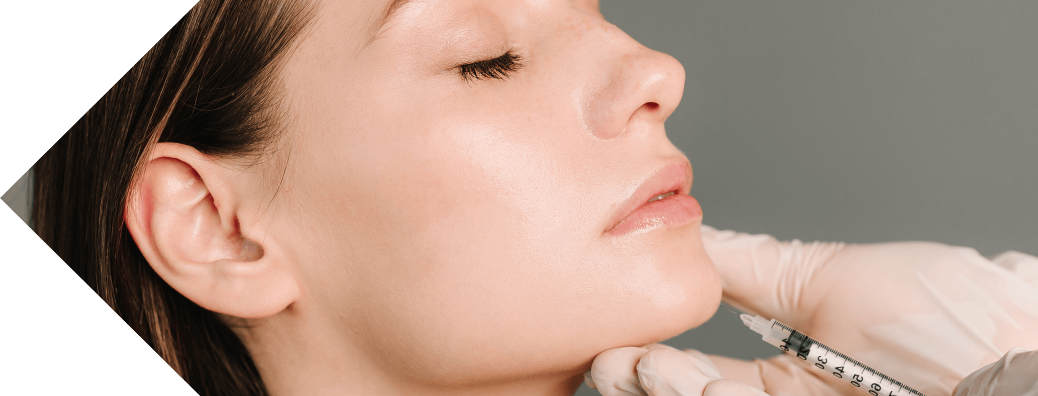 a woman having a chin injection
