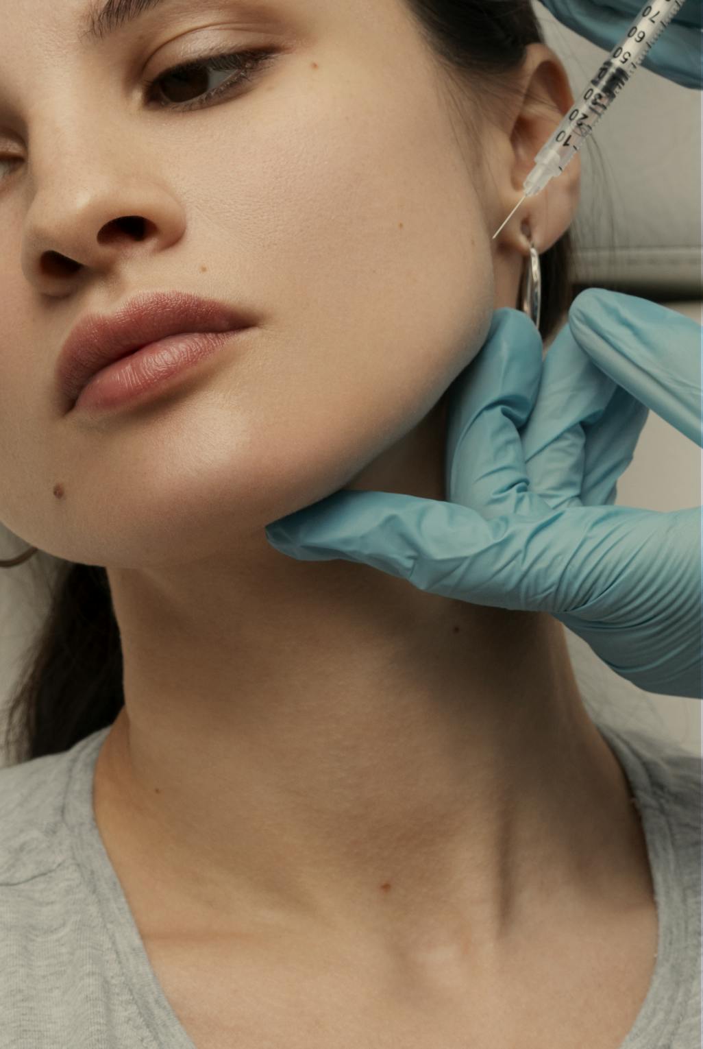 woman having anti wrinkle masseter injection