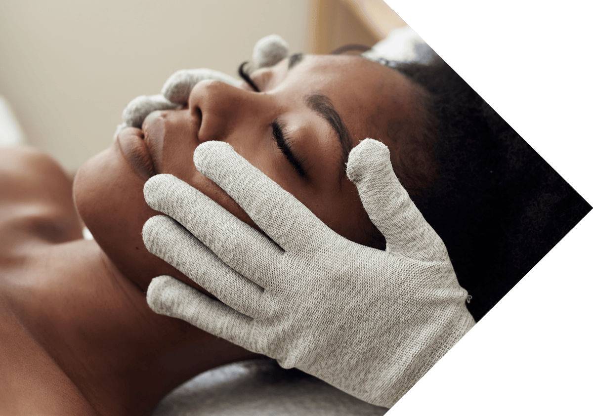 black woman having Dermatosis Papulosa Nigra treatment