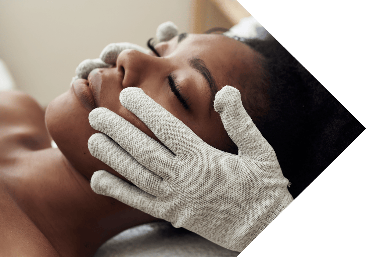 black woman having Dermatosis Papulosa Nigra treatment