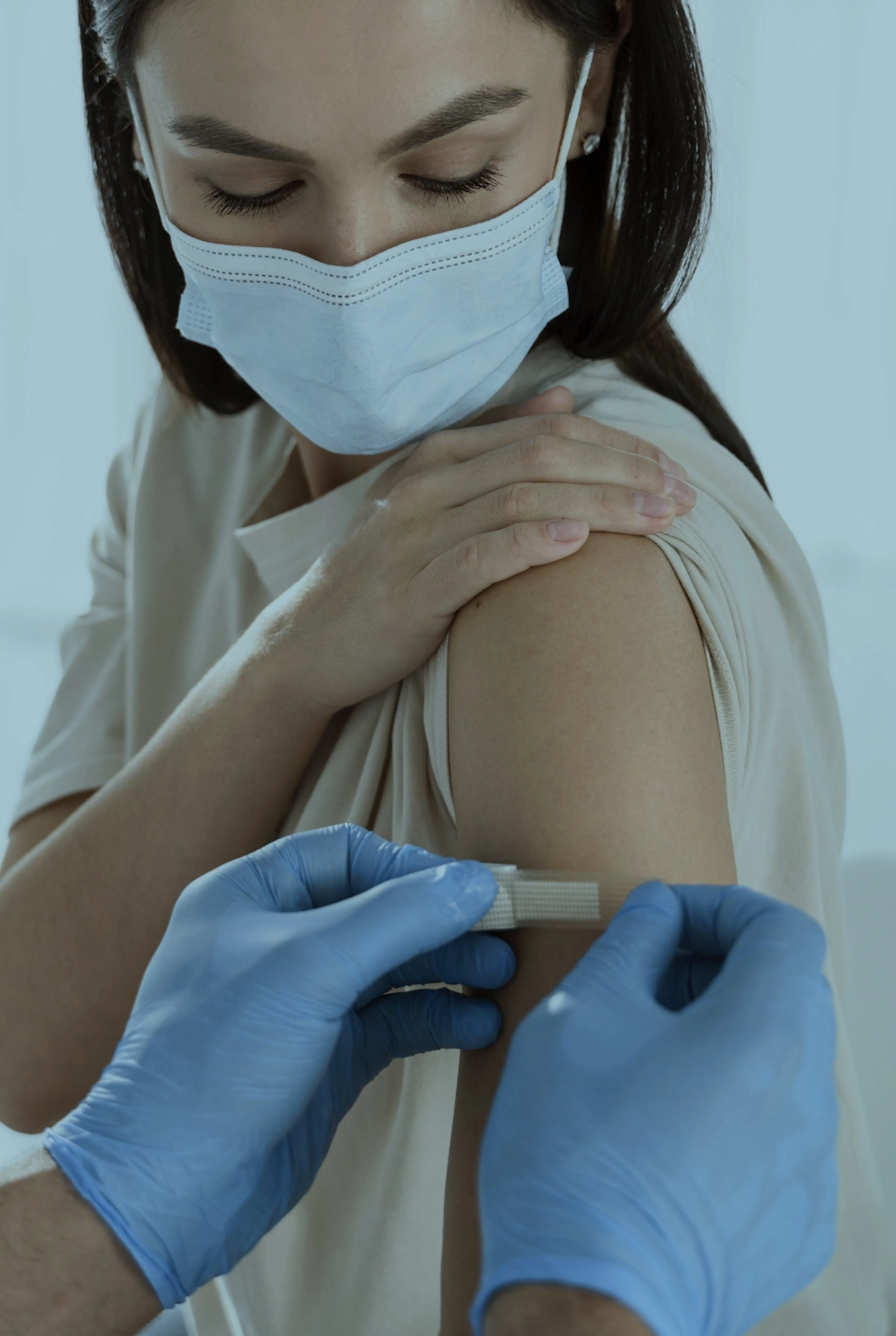 A woman receiving her travel vaccination