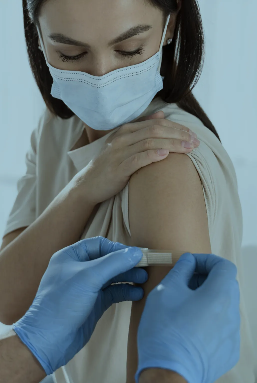 A woman receiving her travel vaccination