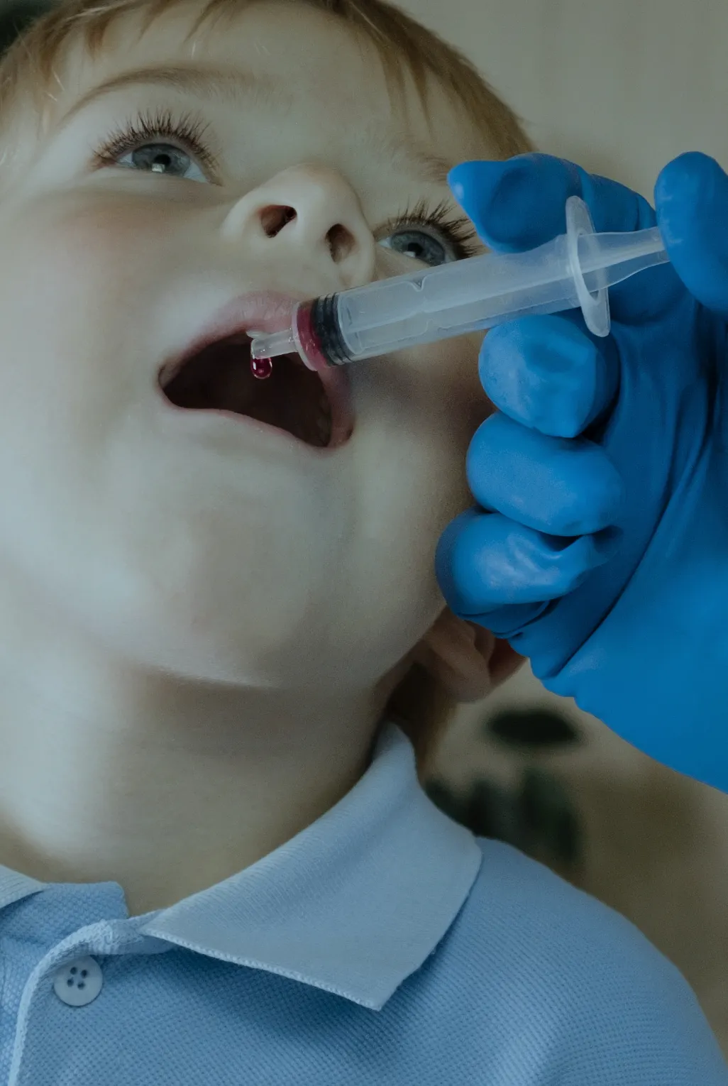 A child having his Cholera vaccine
