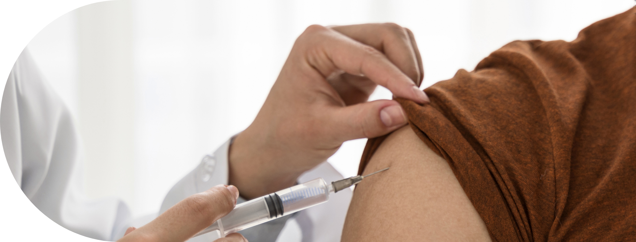 Someone receiving a Rabies Vaccine in the arm