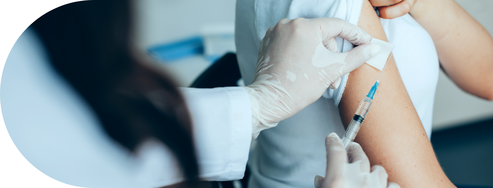 Woman having a Hepititas B vaccine