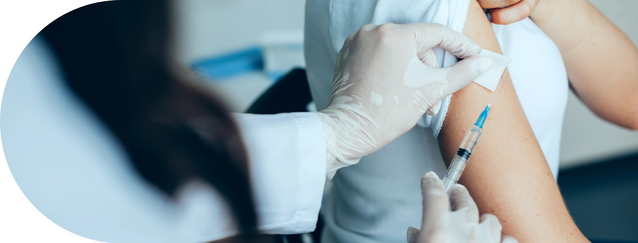 Woman having a Hepititas B vaccine