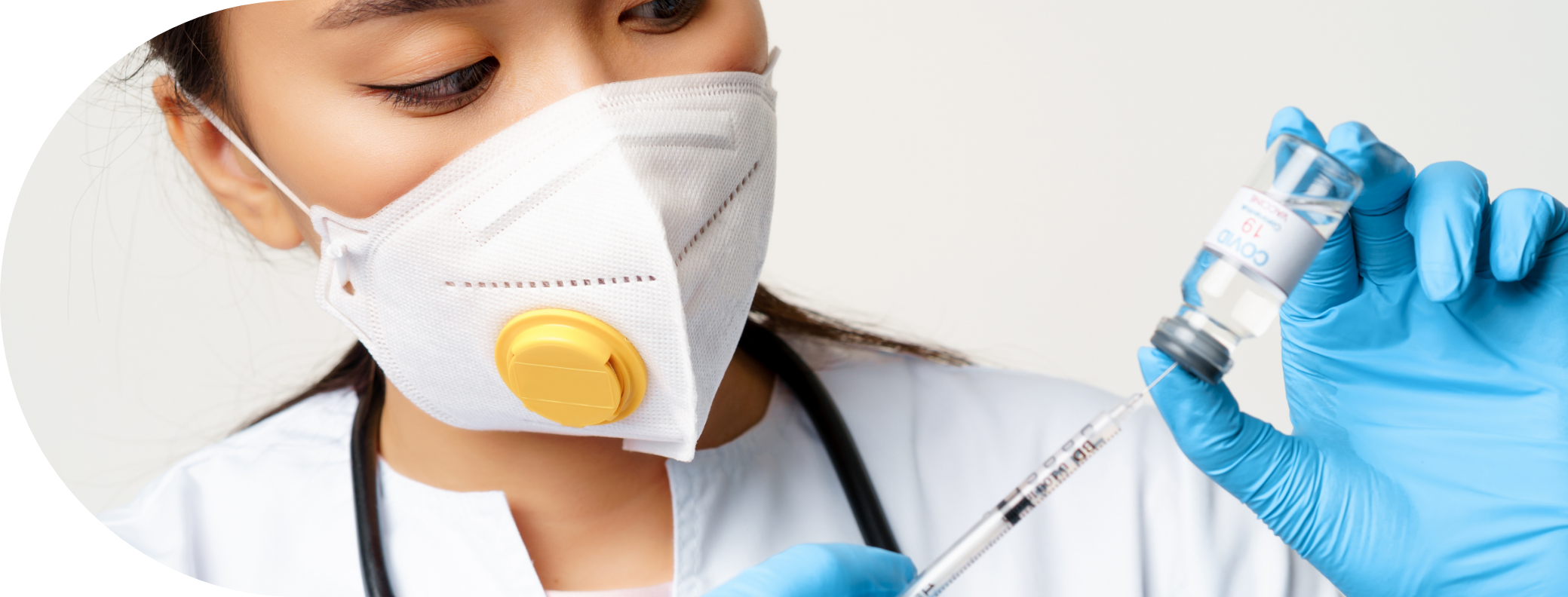 Clinician syringing yellow fever vaccine