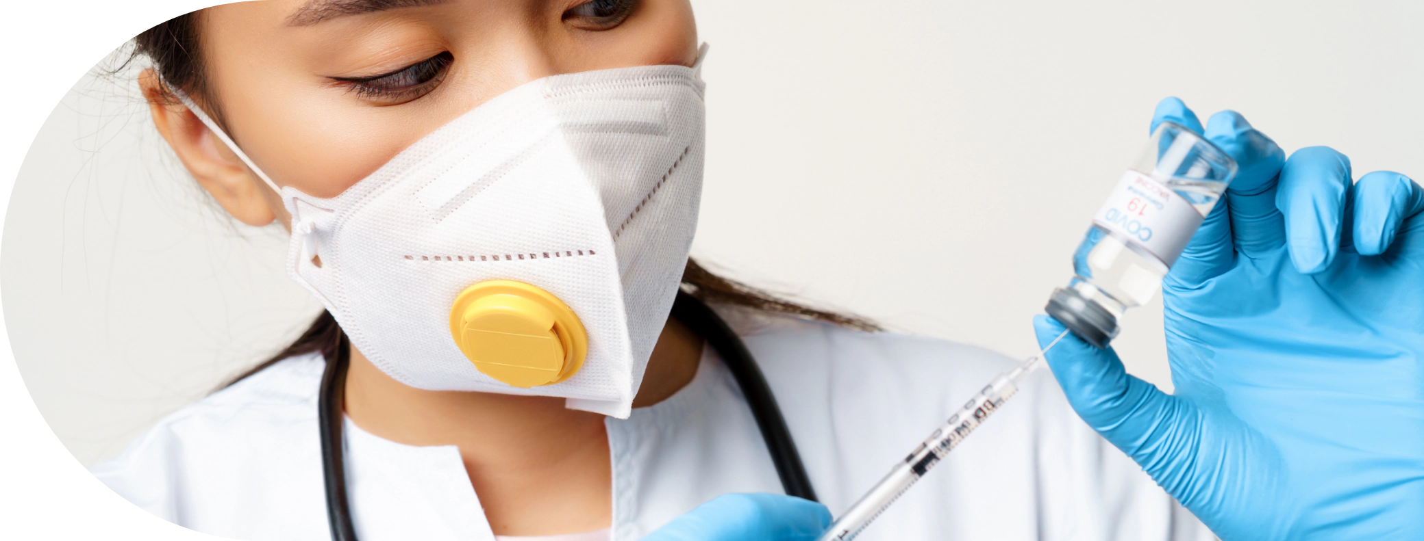 Clinician syringing yellow fever vaccine