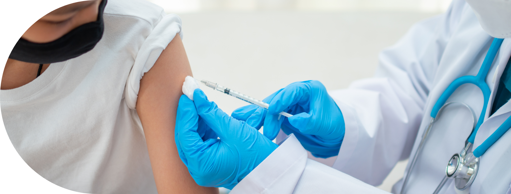 Young boy having the Meningitis vaccine