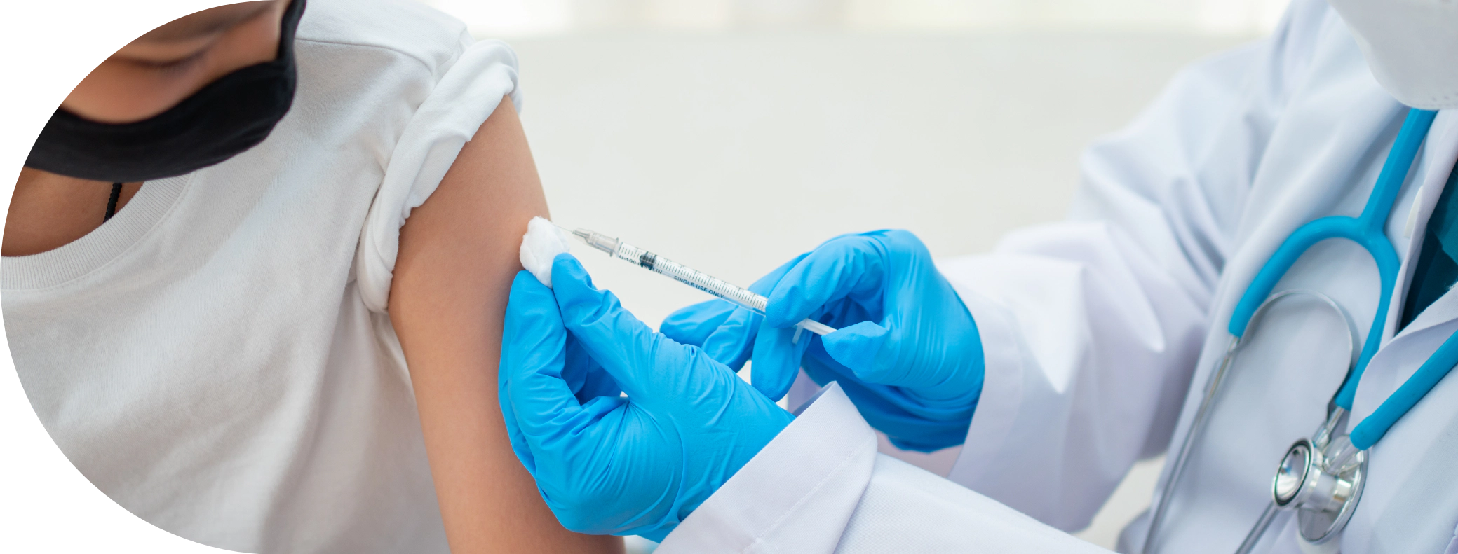 Young boy having the Meningitis vaccine