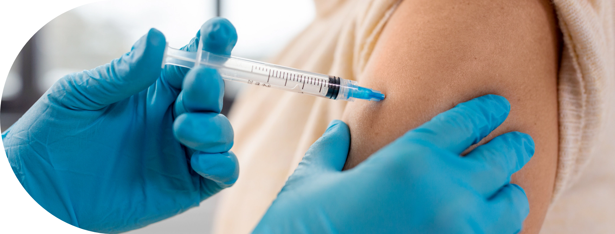 Patient having a vaccination in the arm