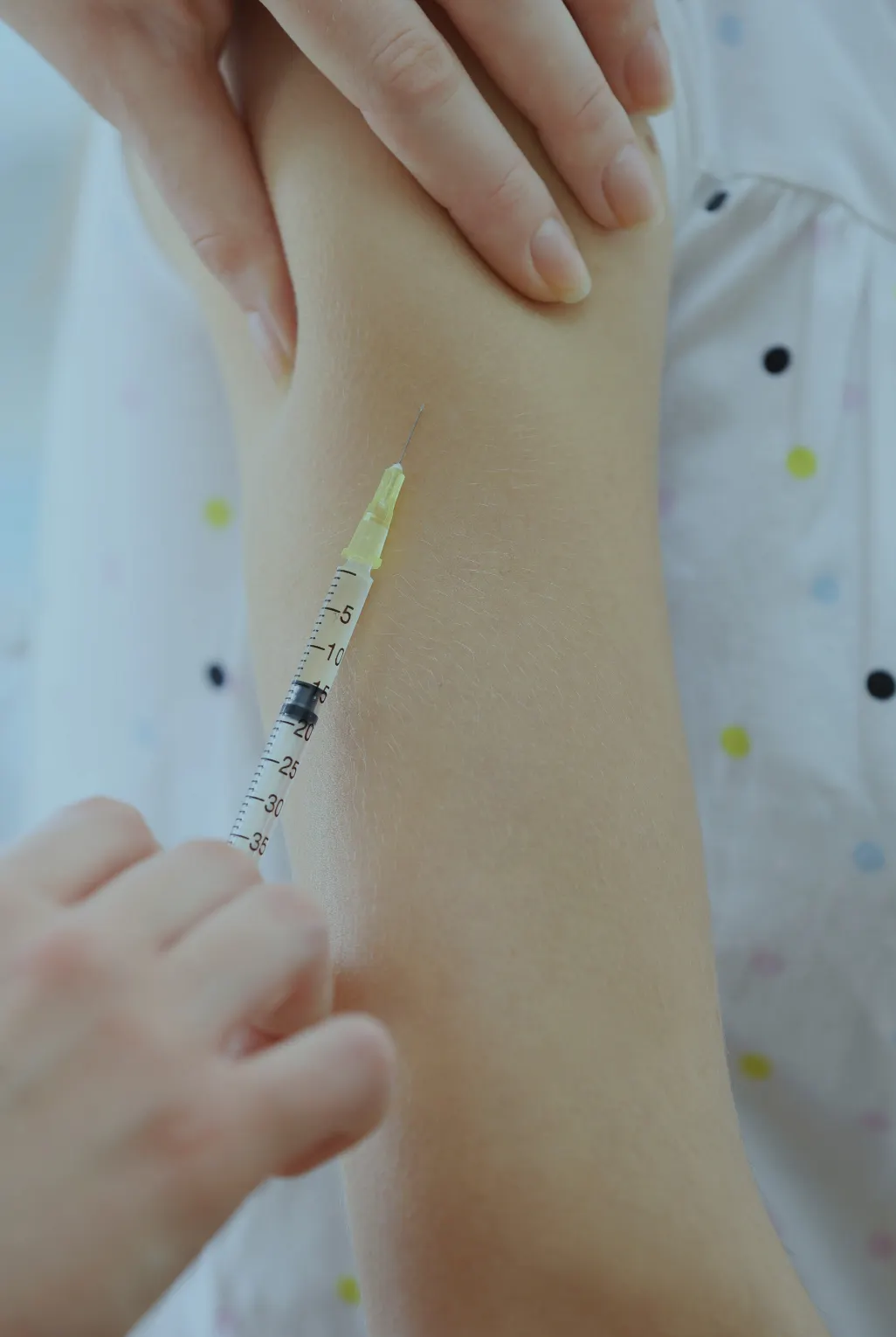 patient having an MMRV vaccination