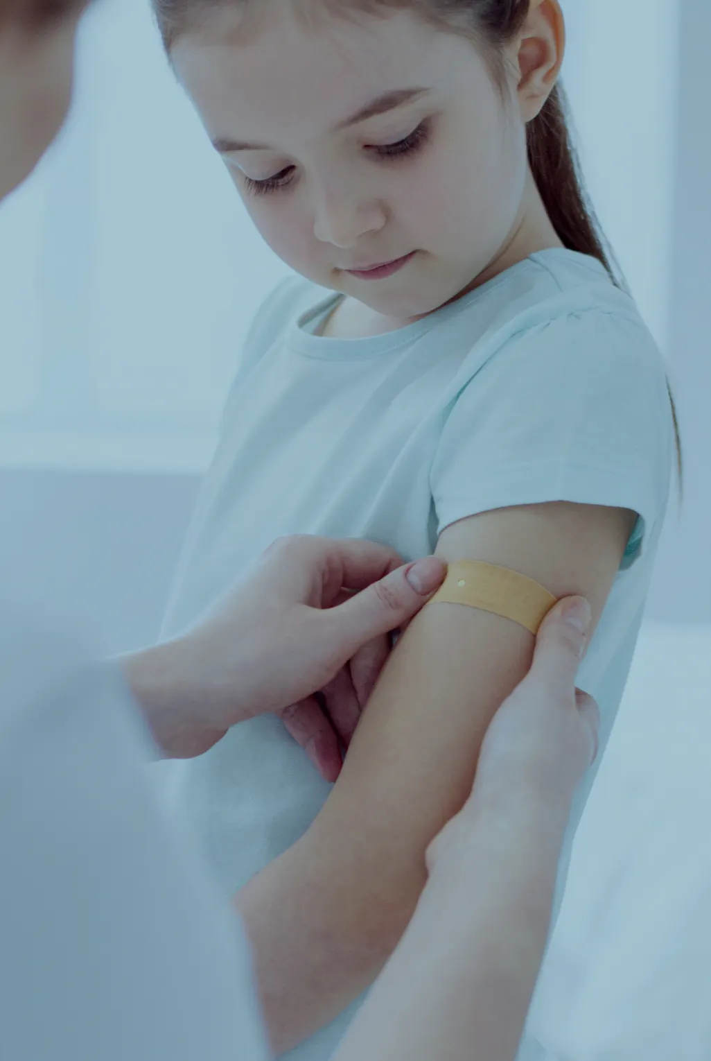 young girl having Meningoccal vaccine