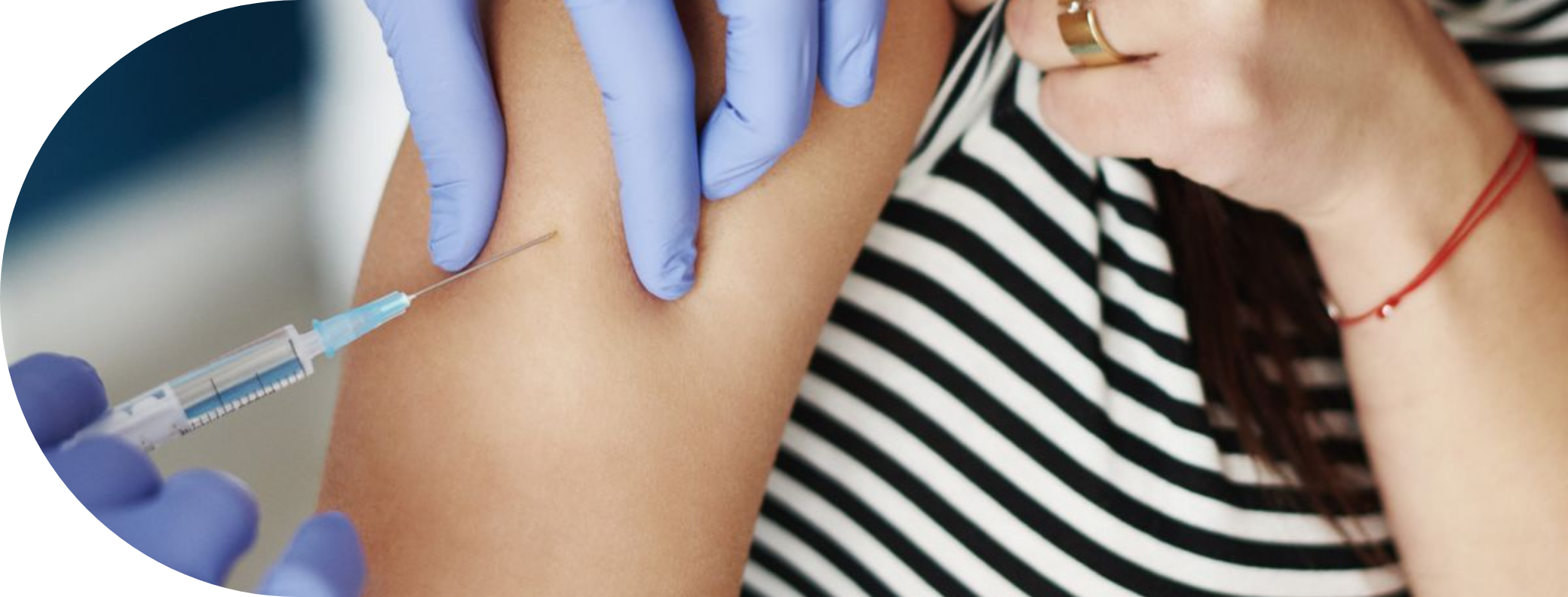 woman having a Hayfever injection into her arm
