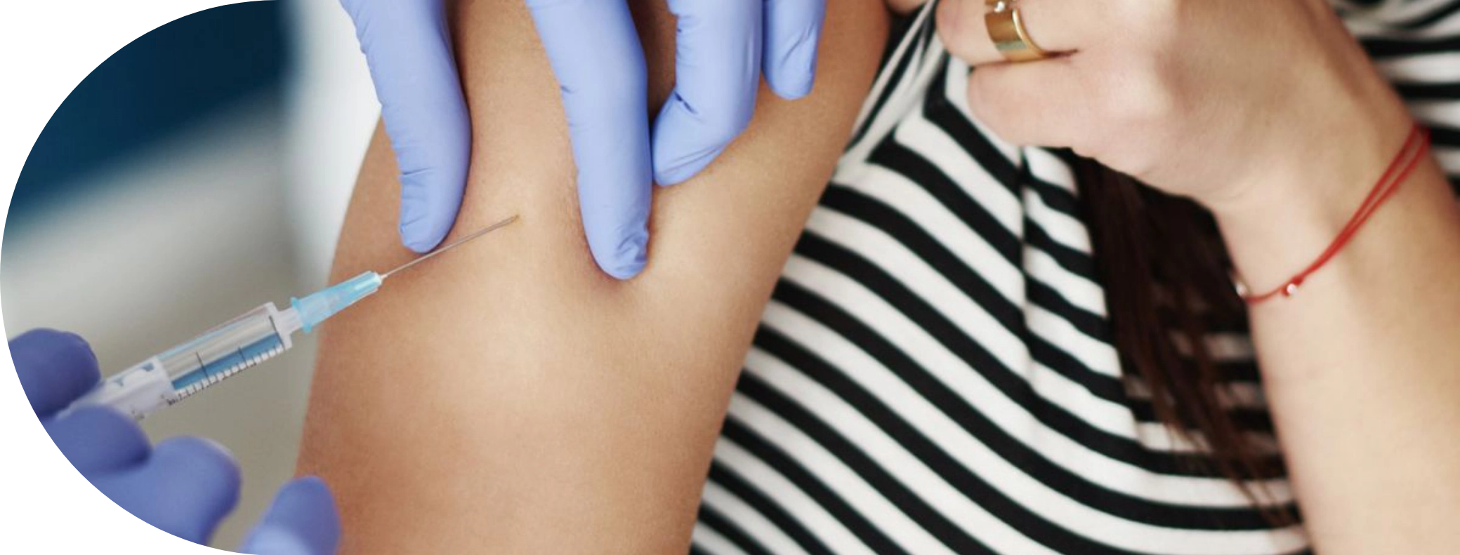 woman having a Hayfever injection into her arm
