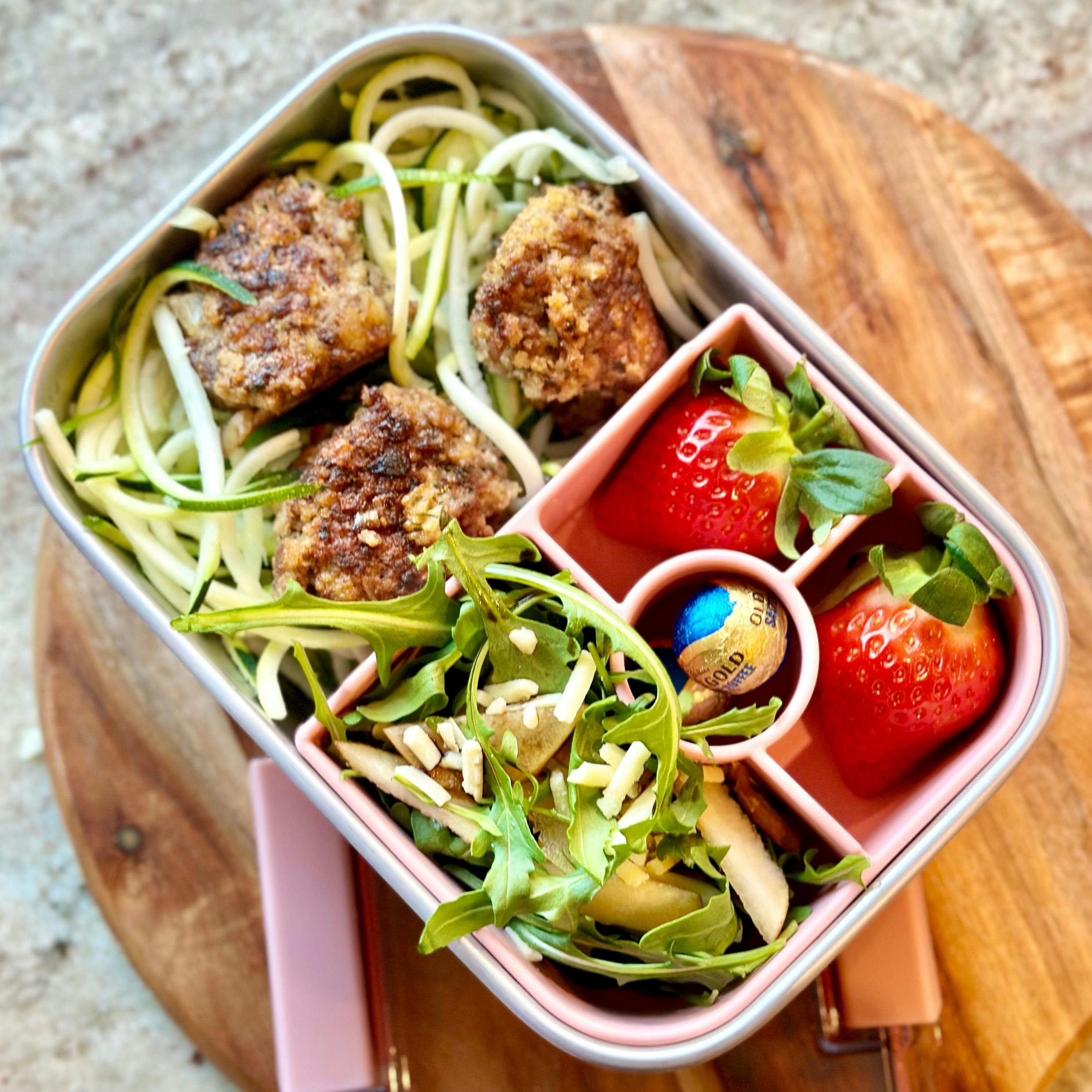 bento box filled with fresh lunch items