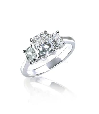 Three stone diamond engagement ring