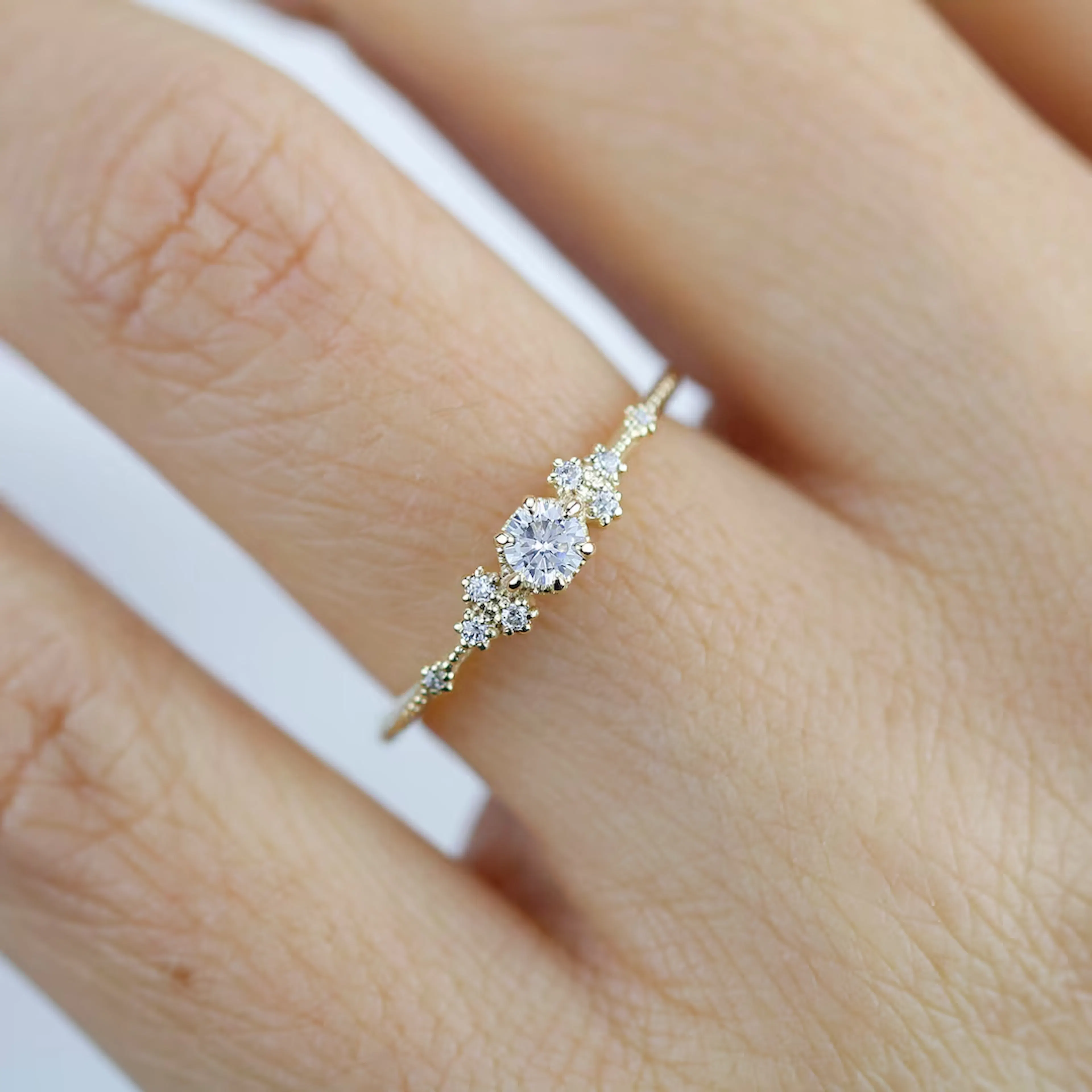 Minimalist solitaire diamond engagement ring