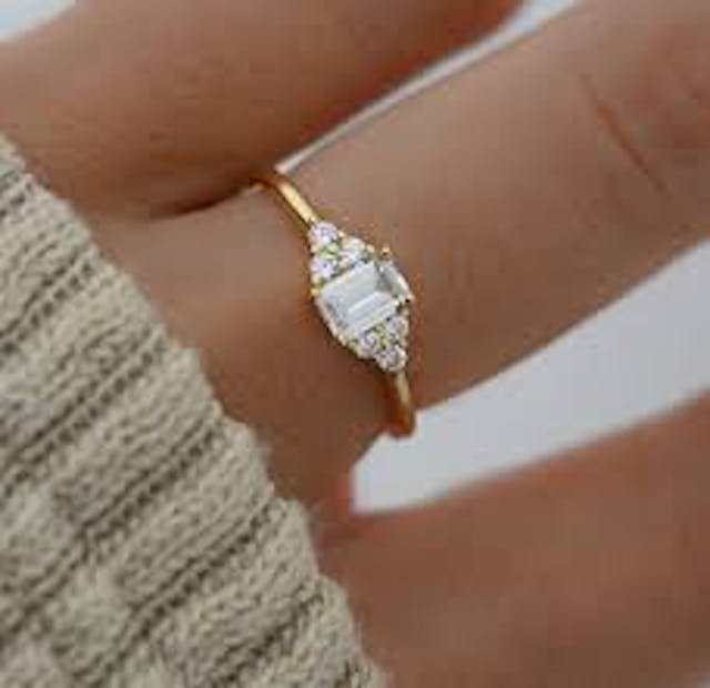  minimalist emerald engagement ring