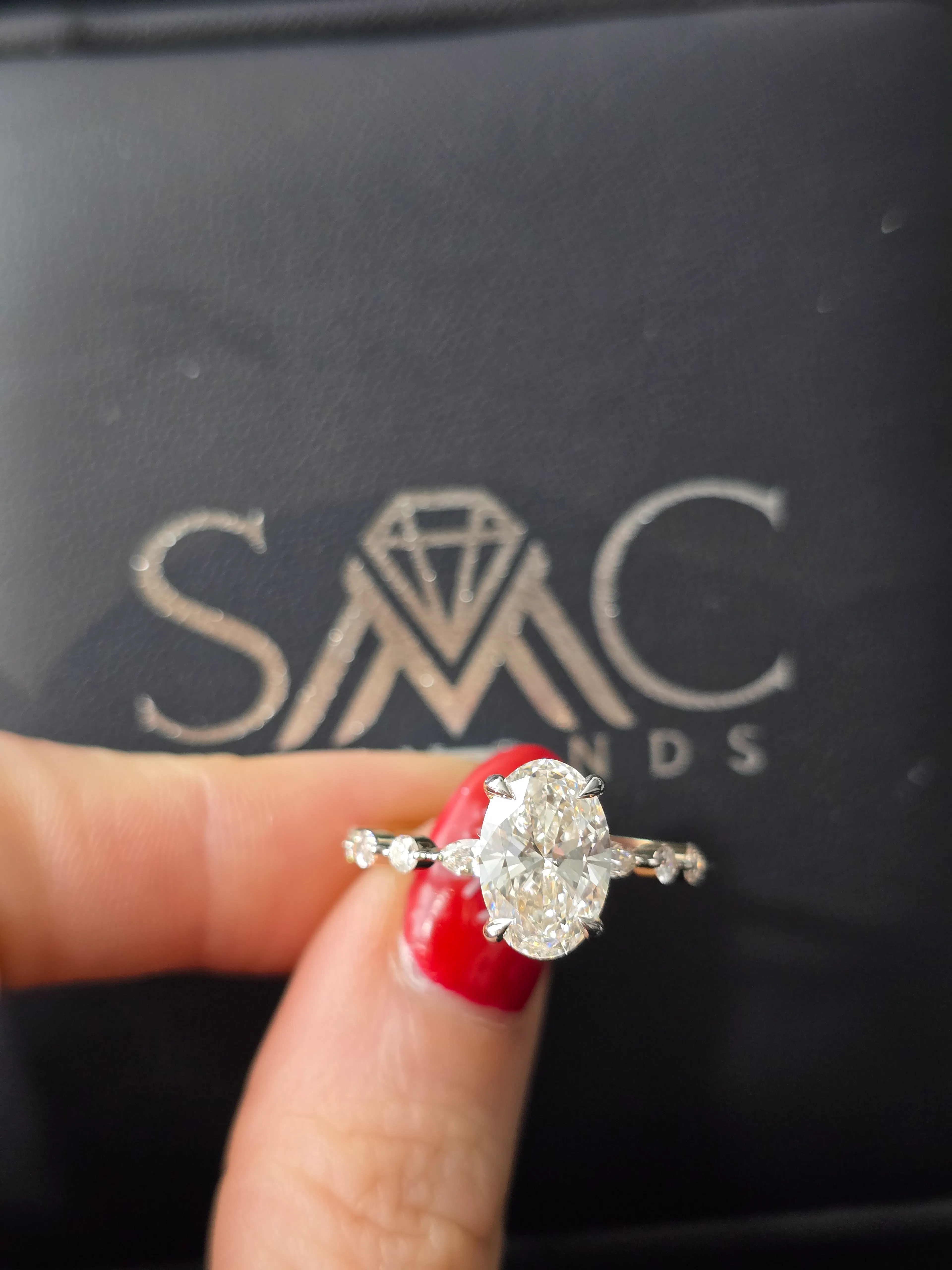 Oval diamond engagement ring in 14K yellow gold at SMC Diamonds Vancouver
