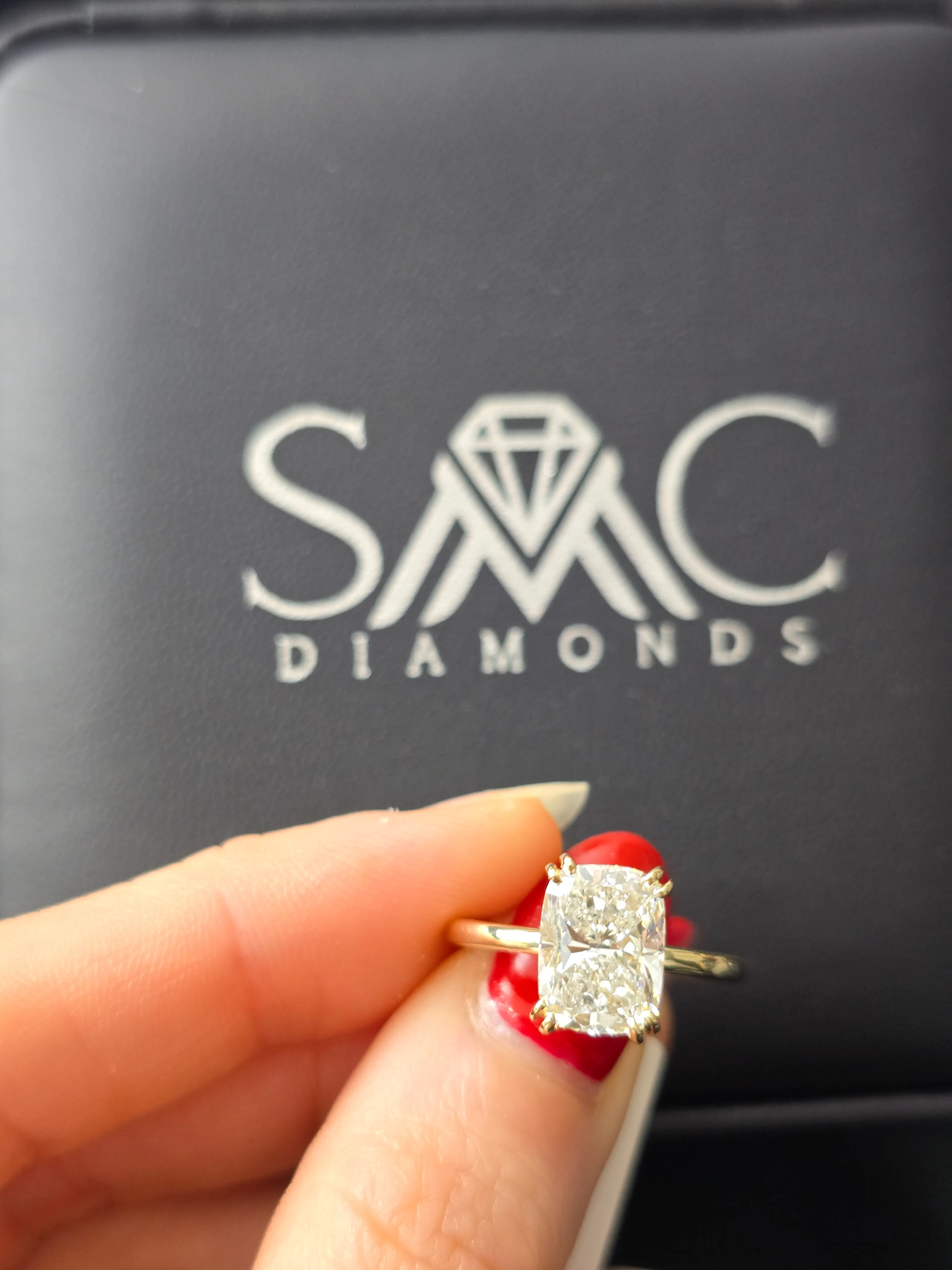 Elongated cushion cut diamond engagement ring in 14K yellow gold at SMC Diamonds Vancouver
