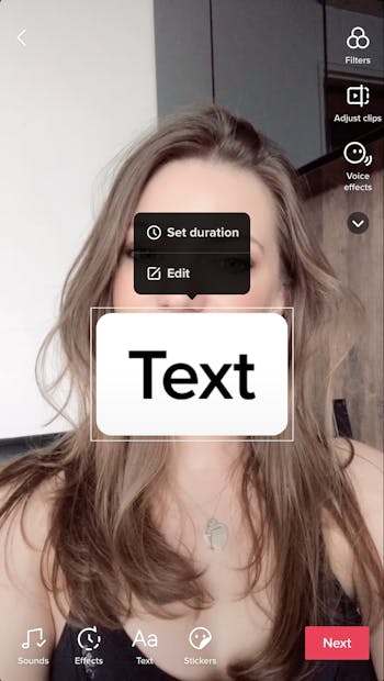 A screenshot of adding text to a TikTok video in the app.