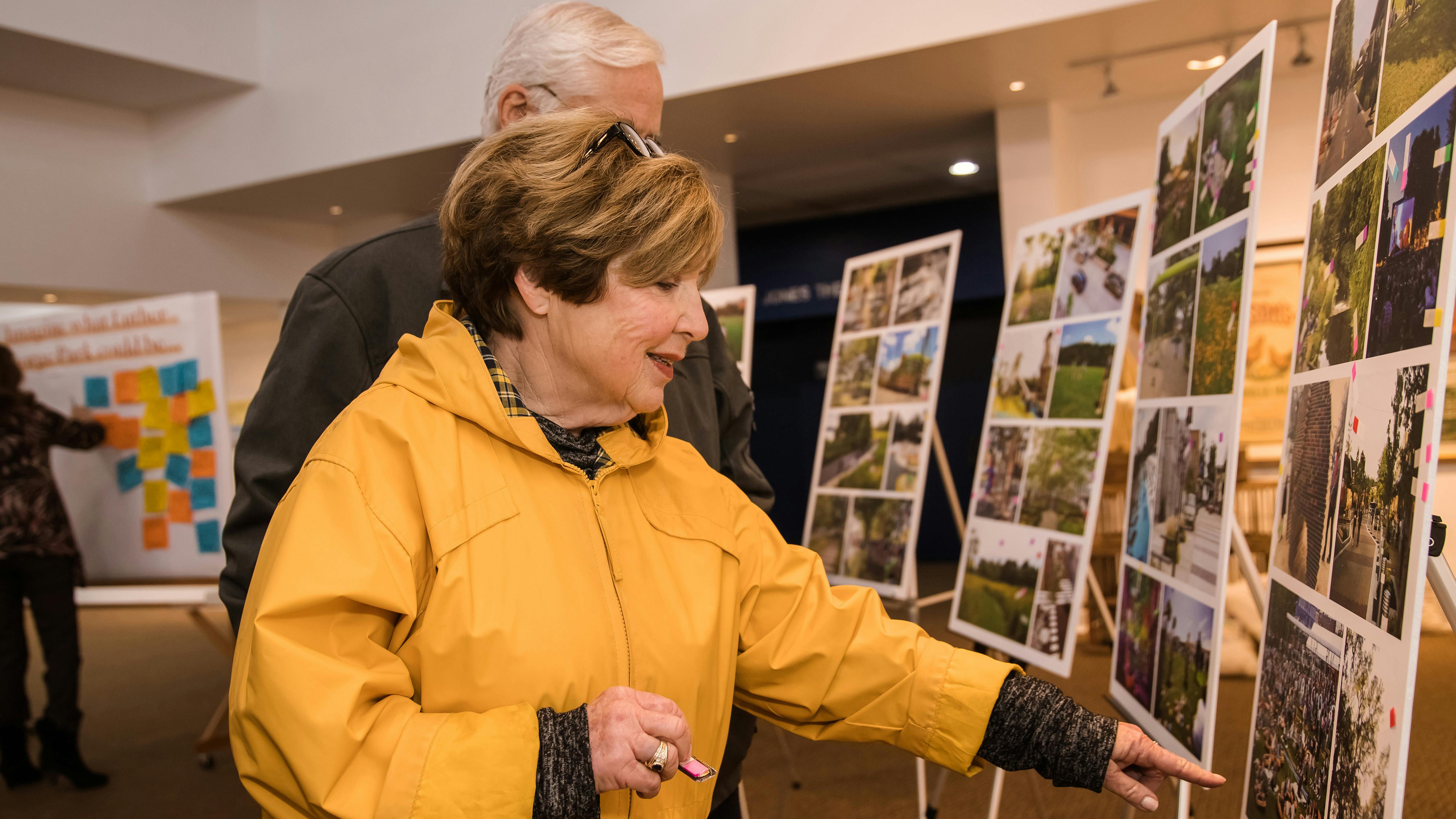 Members of the community attended public workshop and place sticker on images of possible park additions they would like to see.