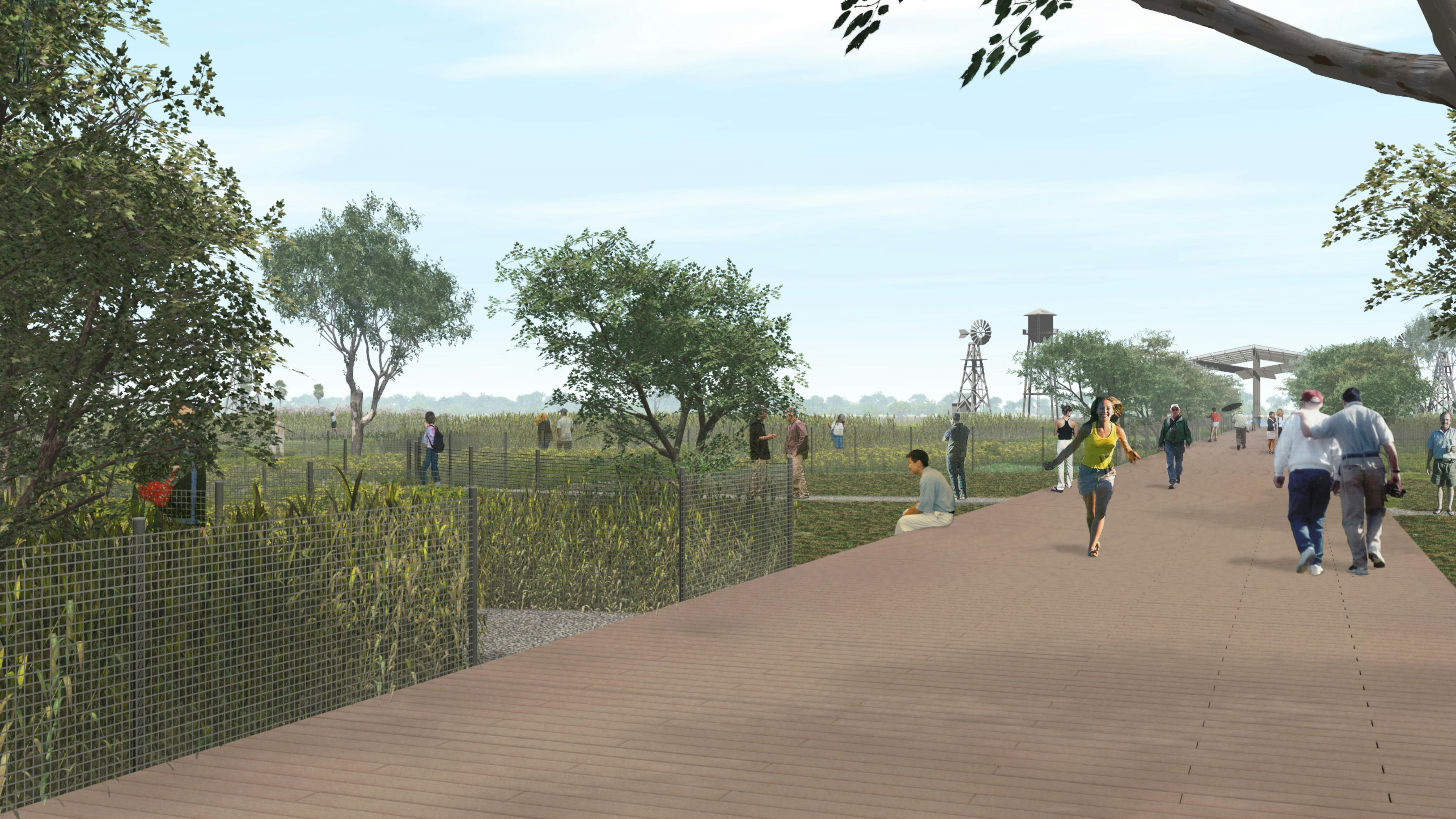 image of boardwalk in farm area with people walking
