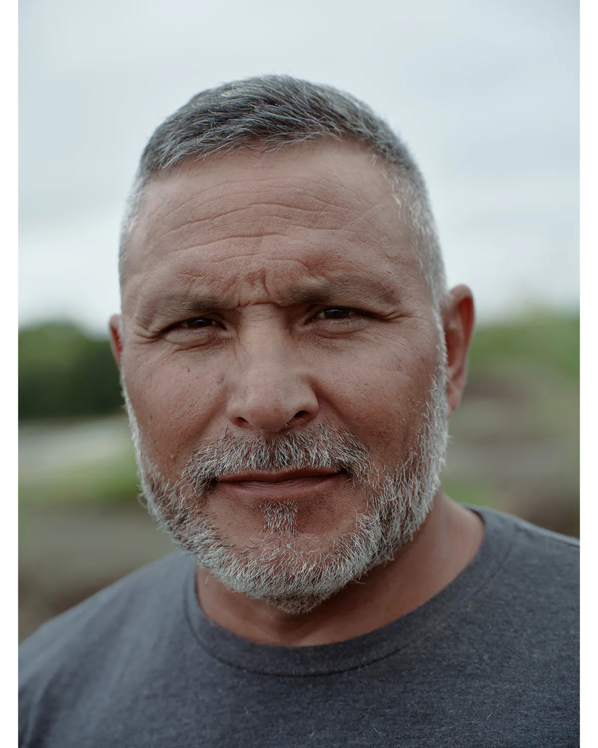 closeup portrait of masculine person with beard