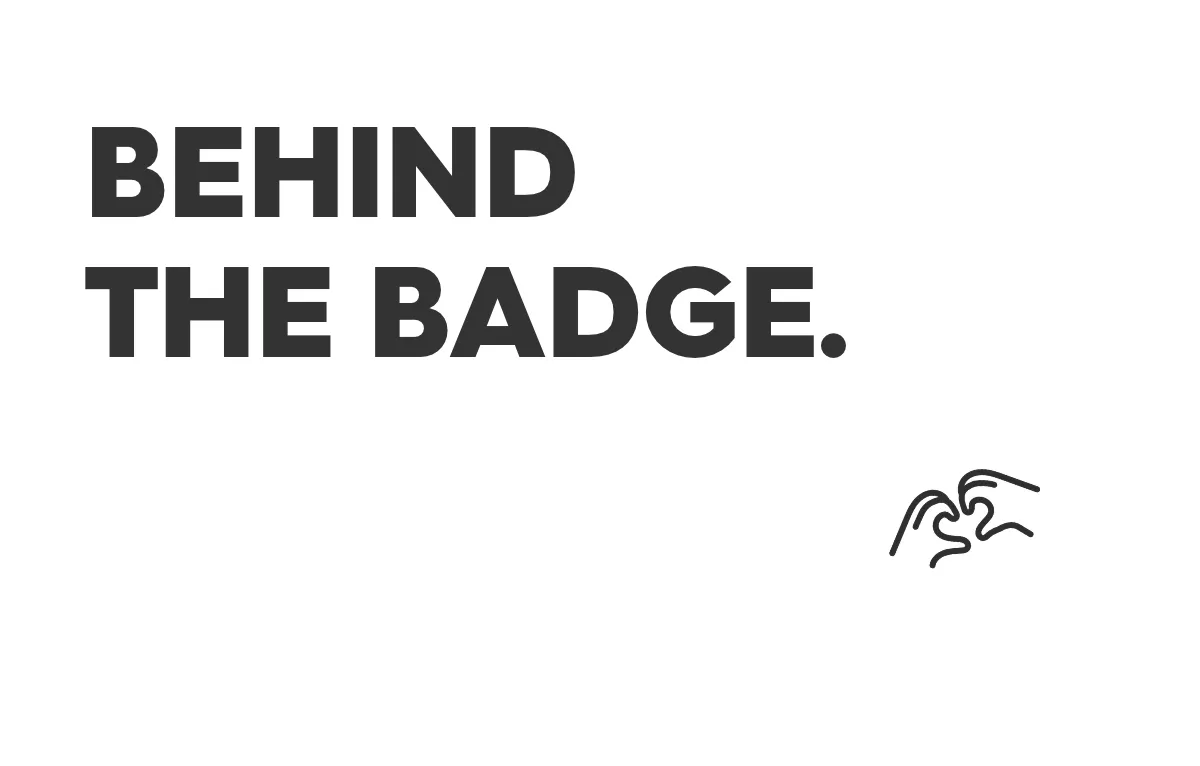 text: behind the badge