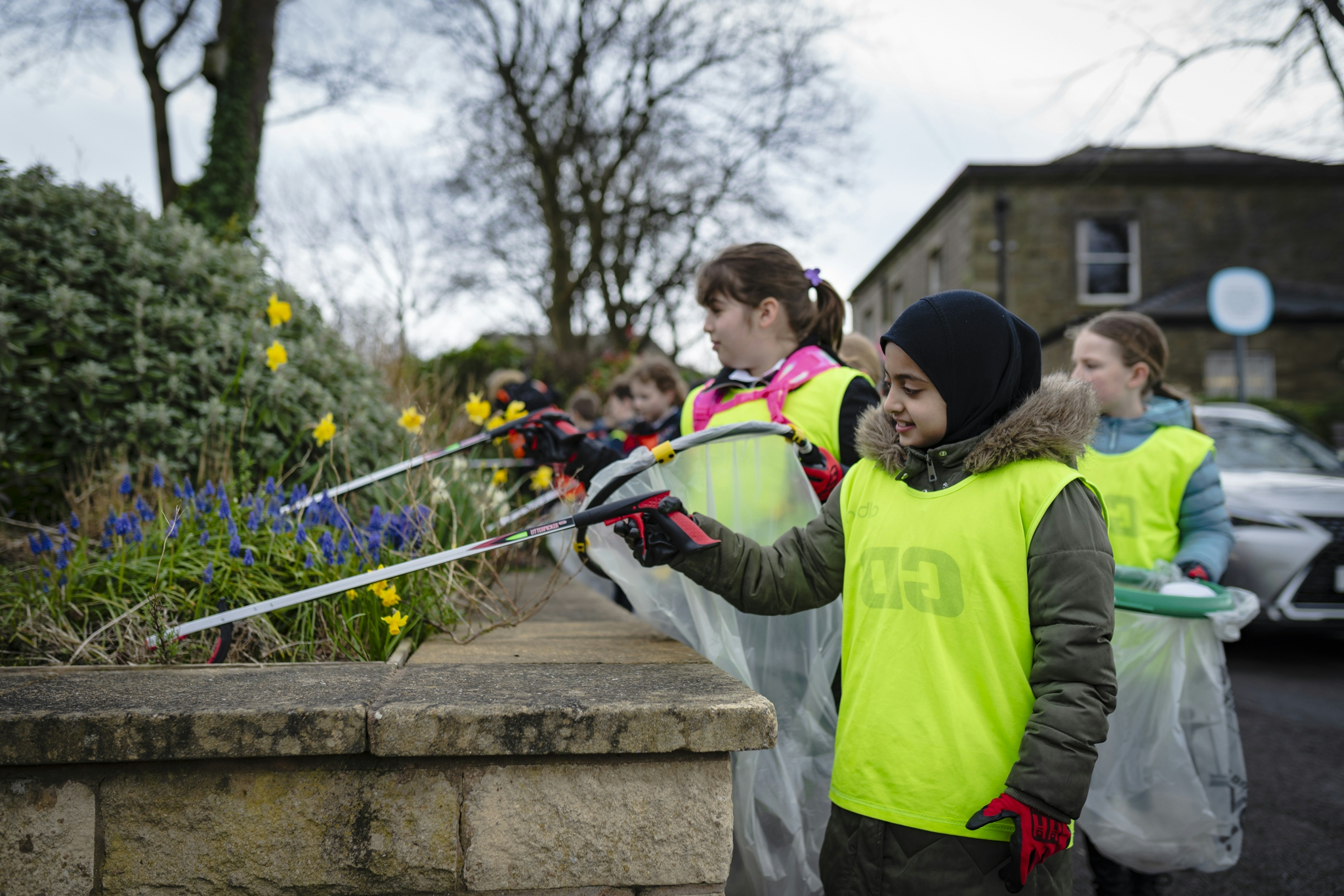 children litter picking