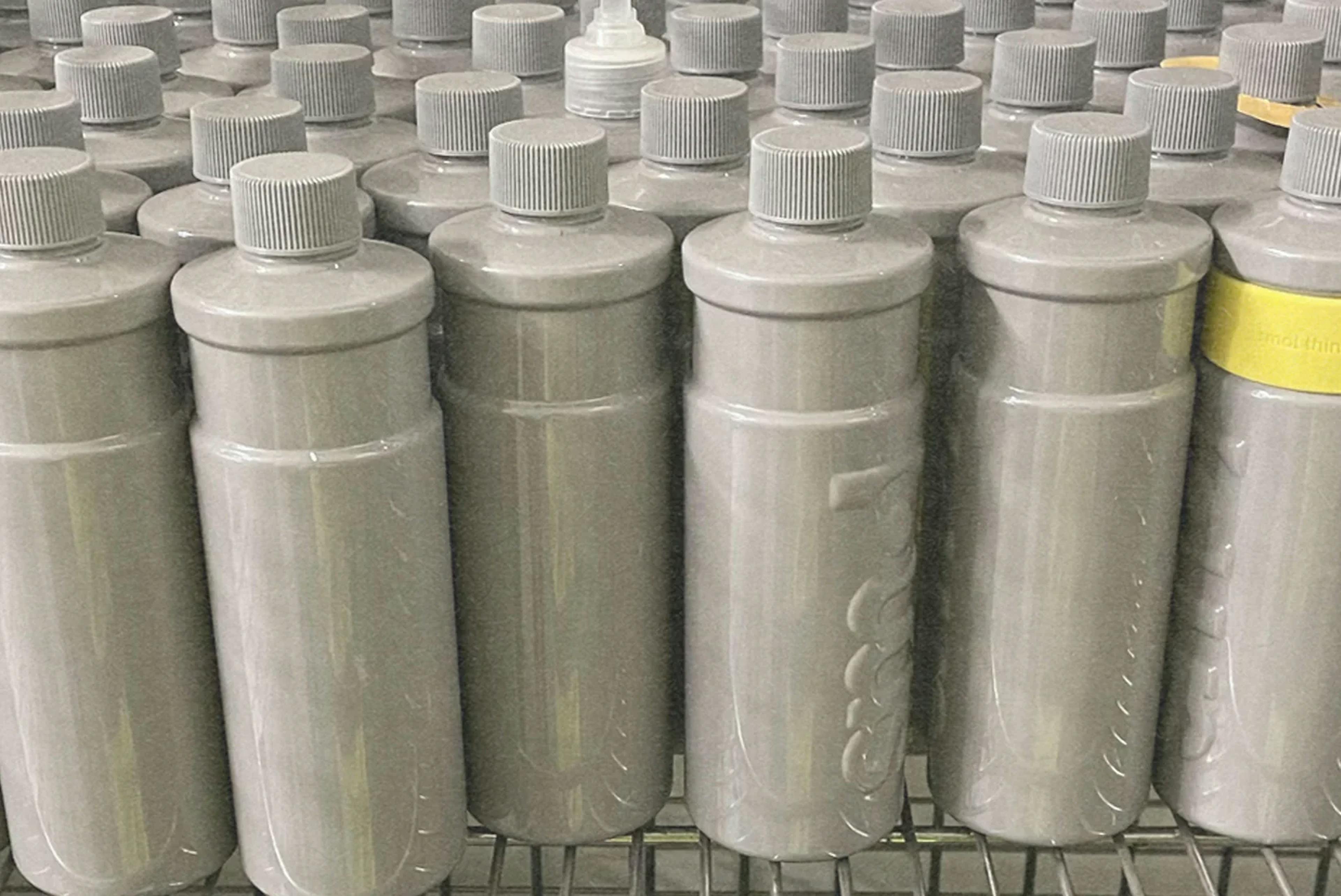 group of smol pcr plastic fabric conditioner bottles