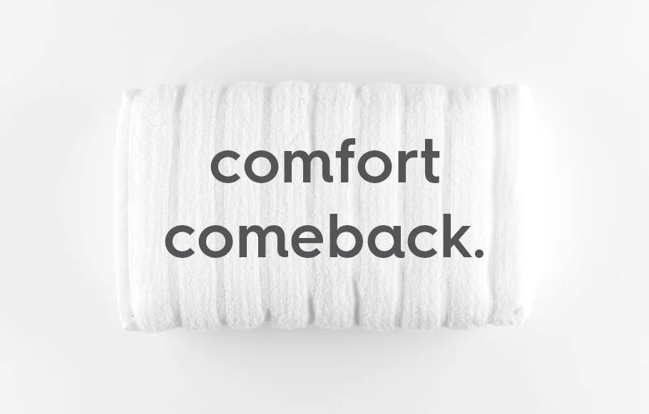 white rolled up towel on a white background. text: comfort comeback.