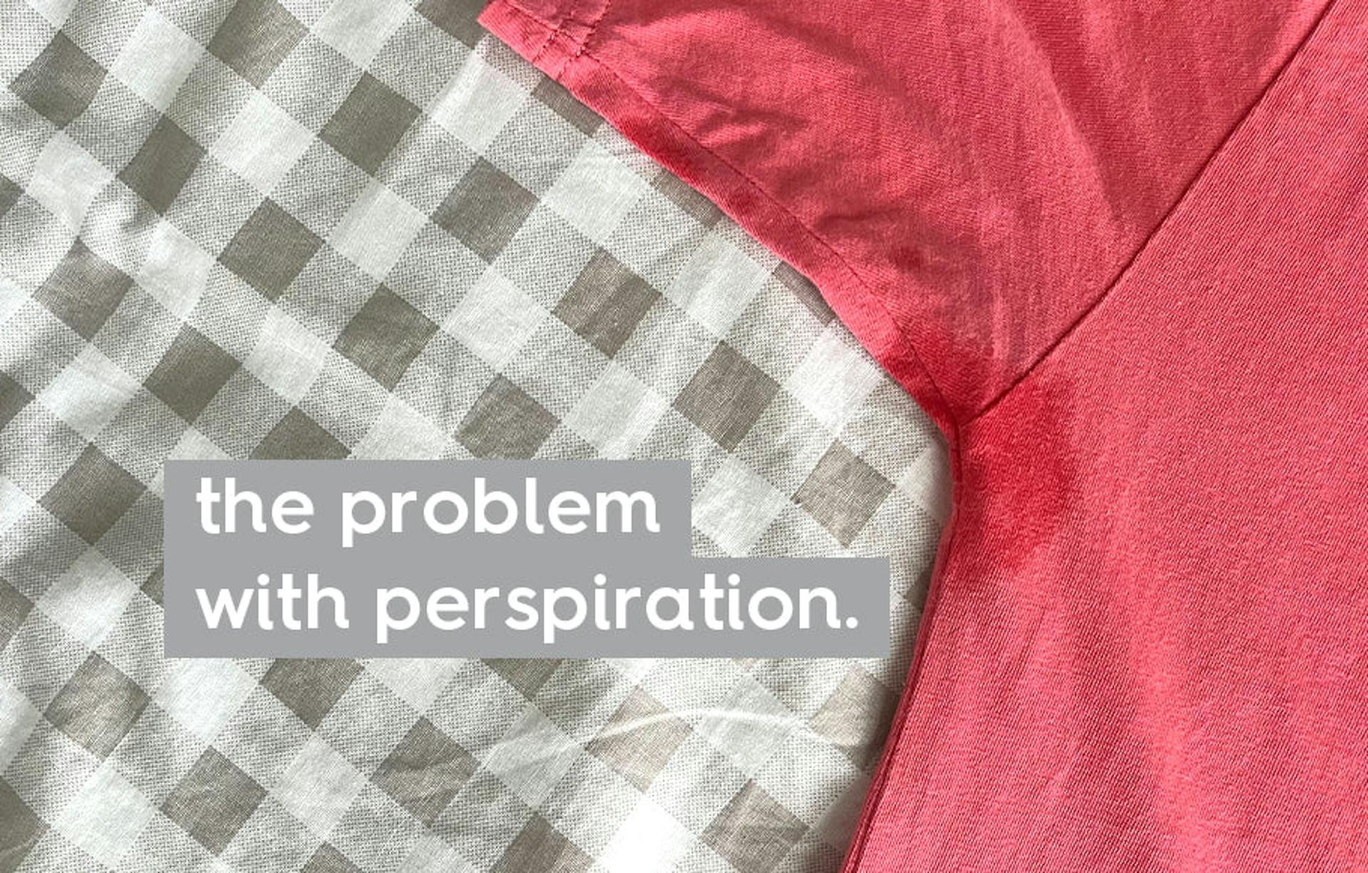 tshirt laid out flat with sweat stain. text: the problem with perspiration.