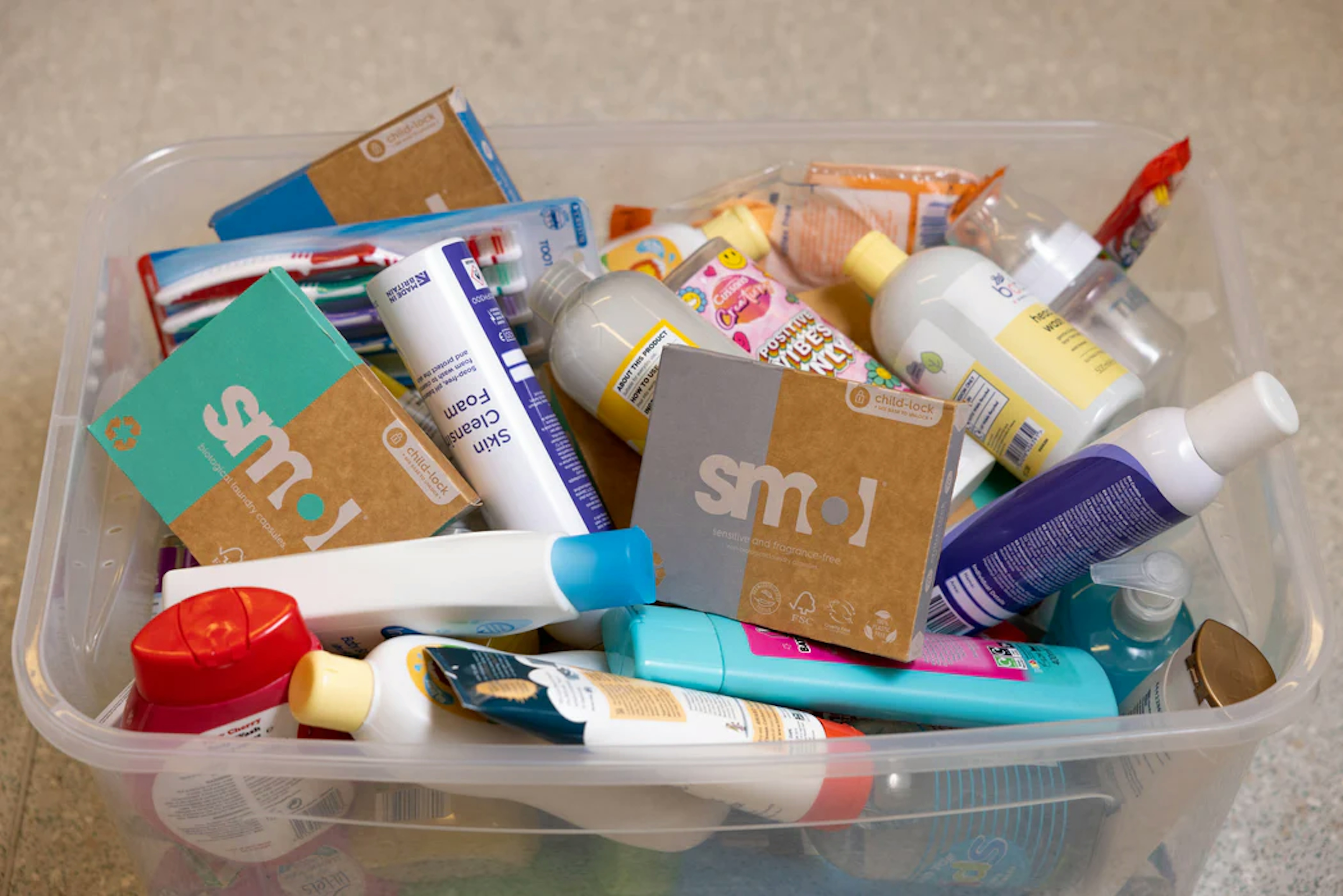 box of hygiene products including smol laundry packs