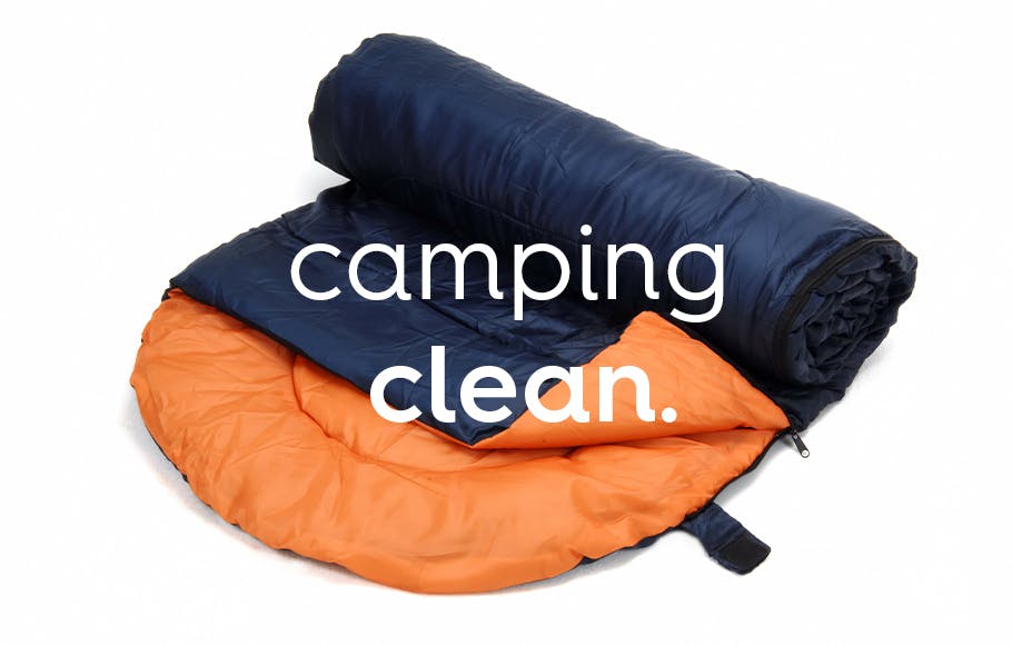 image of a black and orange sleeping bag. text: camping clean