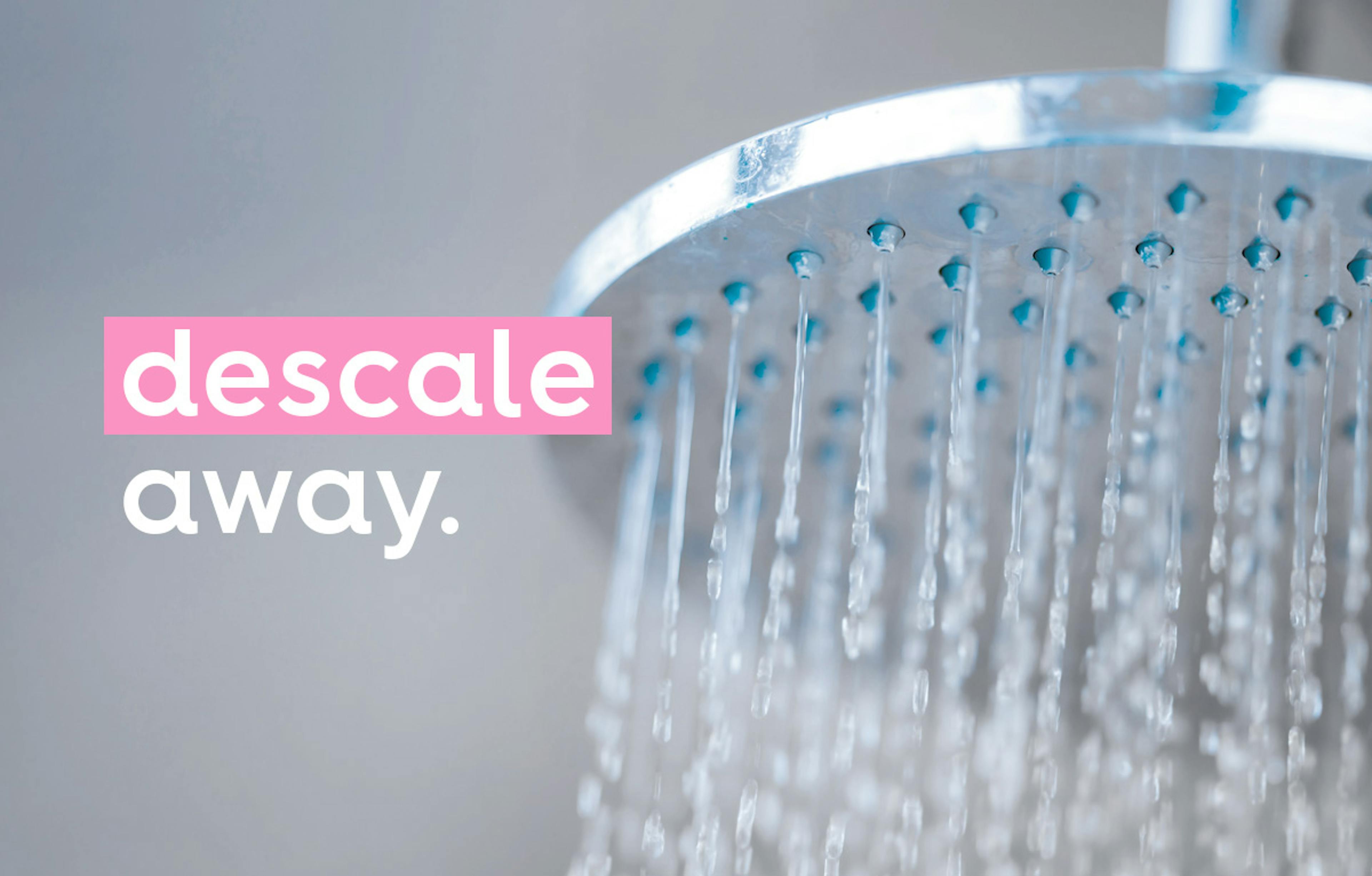 photo of a shower head running with water. Text: descale away.