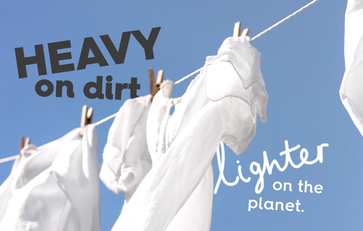 white laundry hanging on a washing line with a blue sky. Text: heavy on dirt, lighter on the planet.