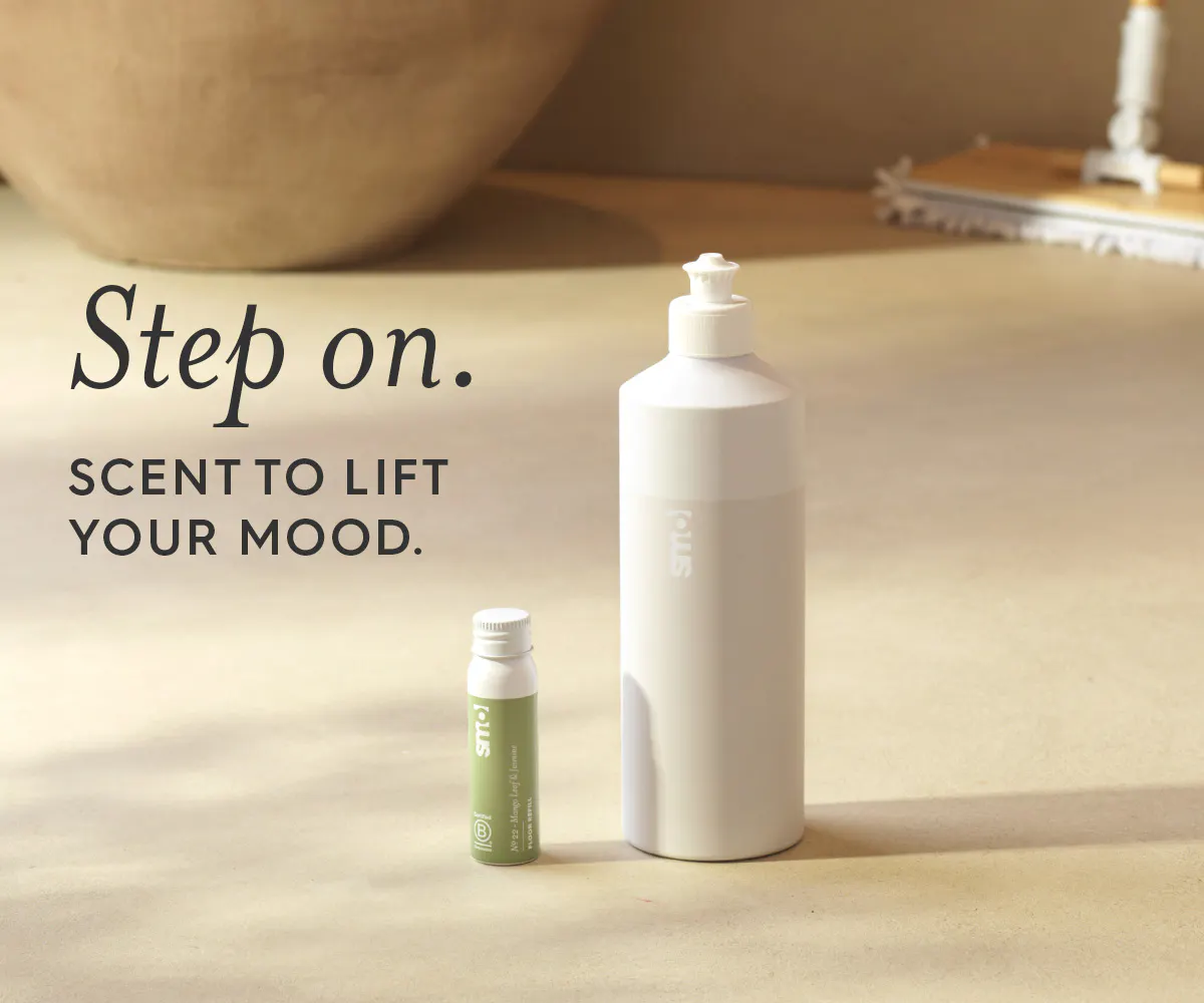 Floor reset bottle, text: step on, scent to lift your mood.