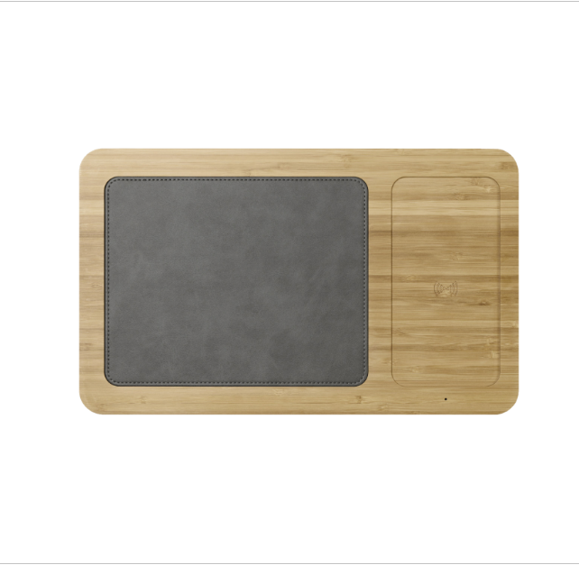 black color pad on brown wooden 