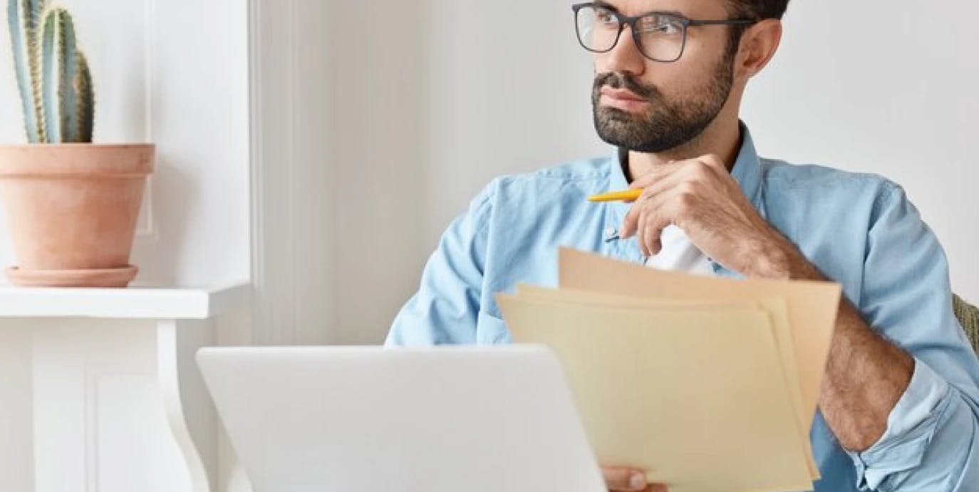 Man with finance papers