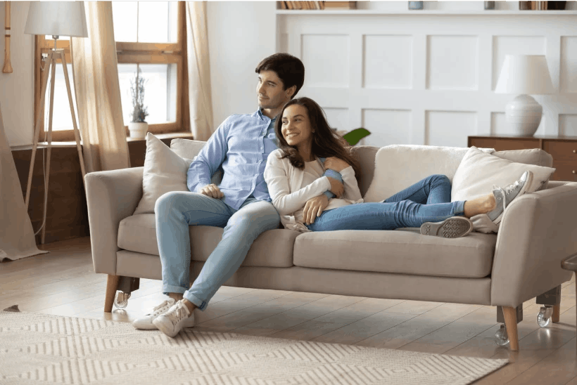 Couple relaxing on a sofa